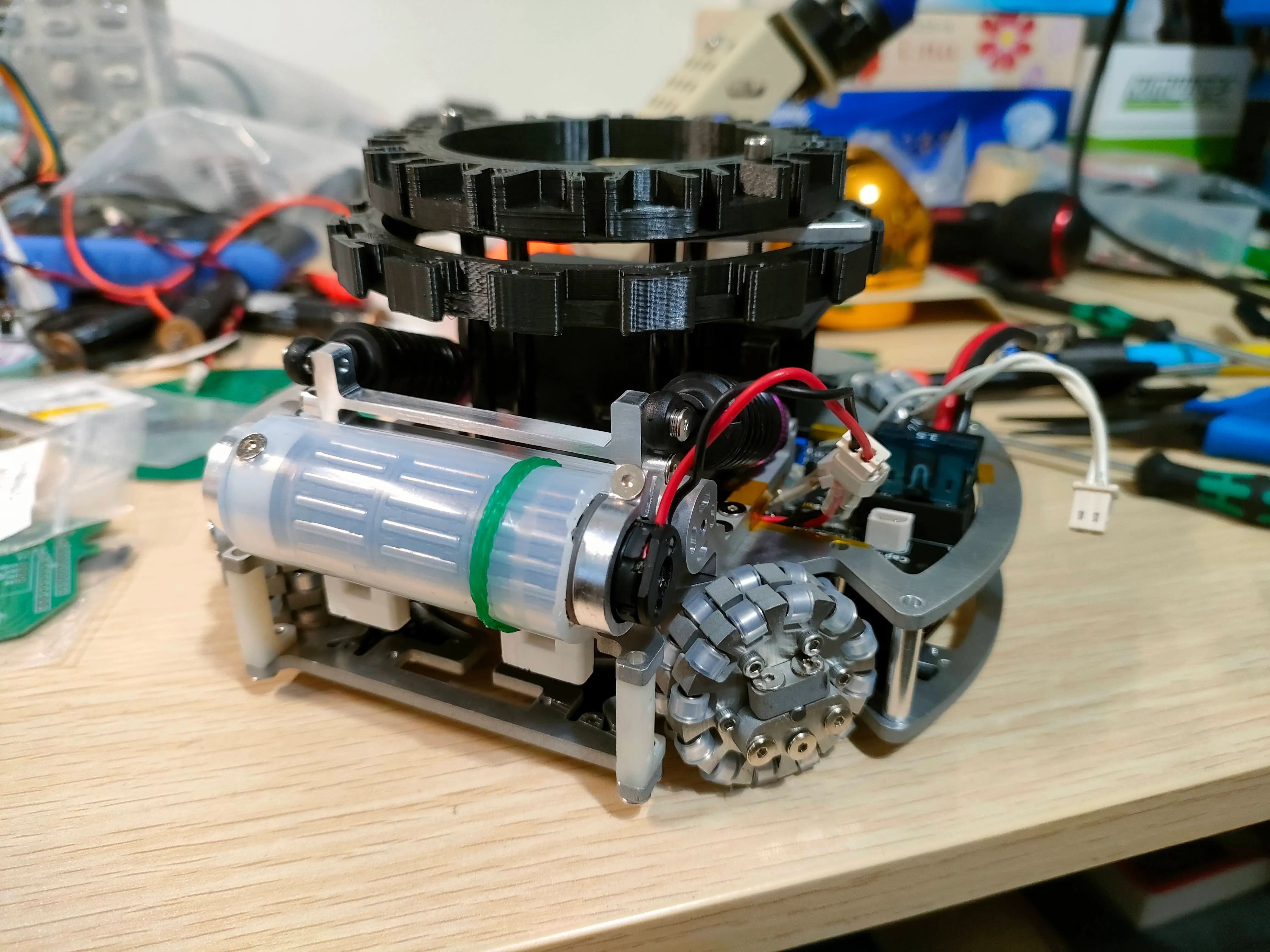 Side view of a prototype dribbler mounted on the Cranes soccer robot